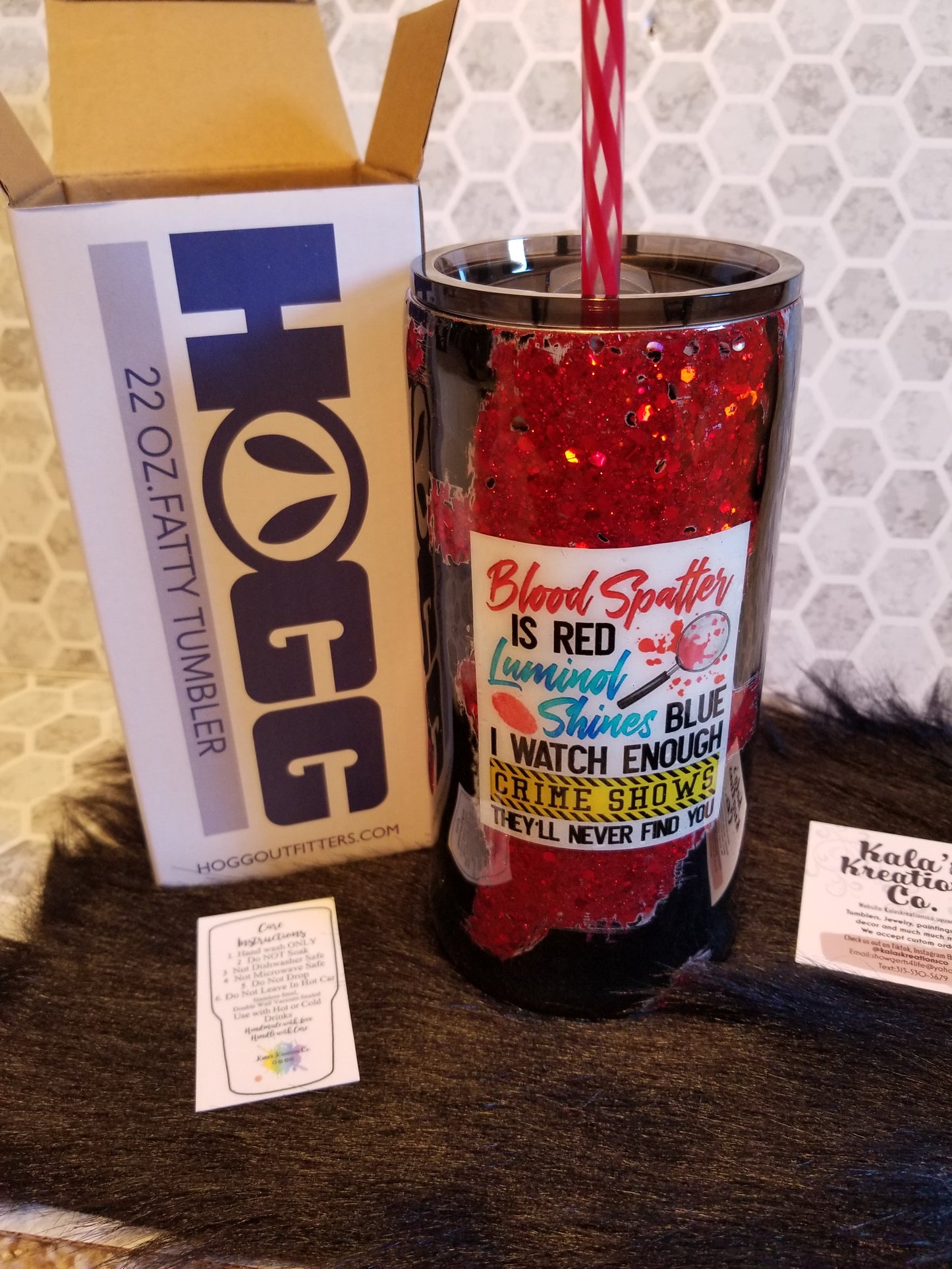 22oz Crime show blood splatter is red quote tumbler