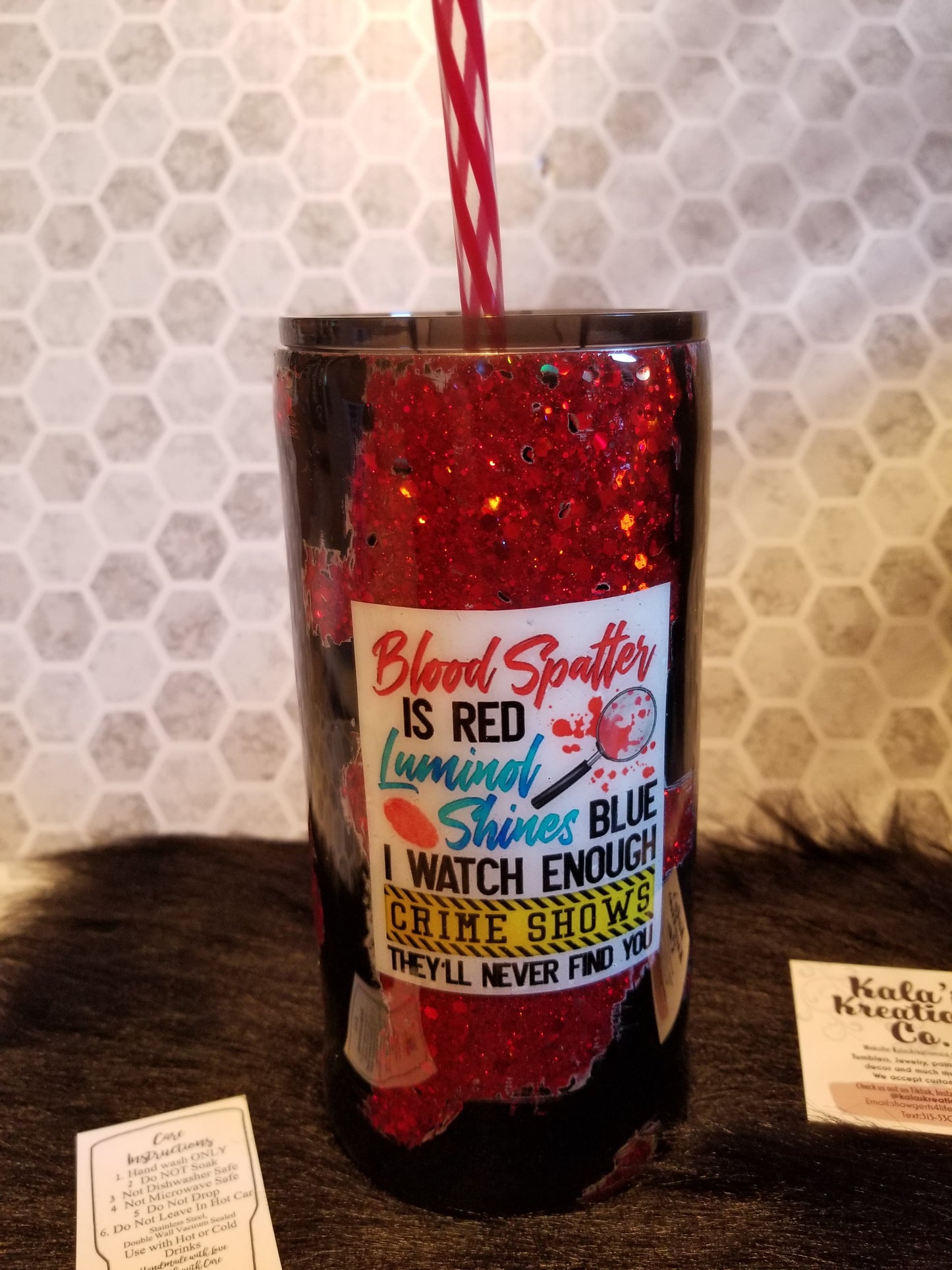22oz Crime show blood splatter is red quote tumbler