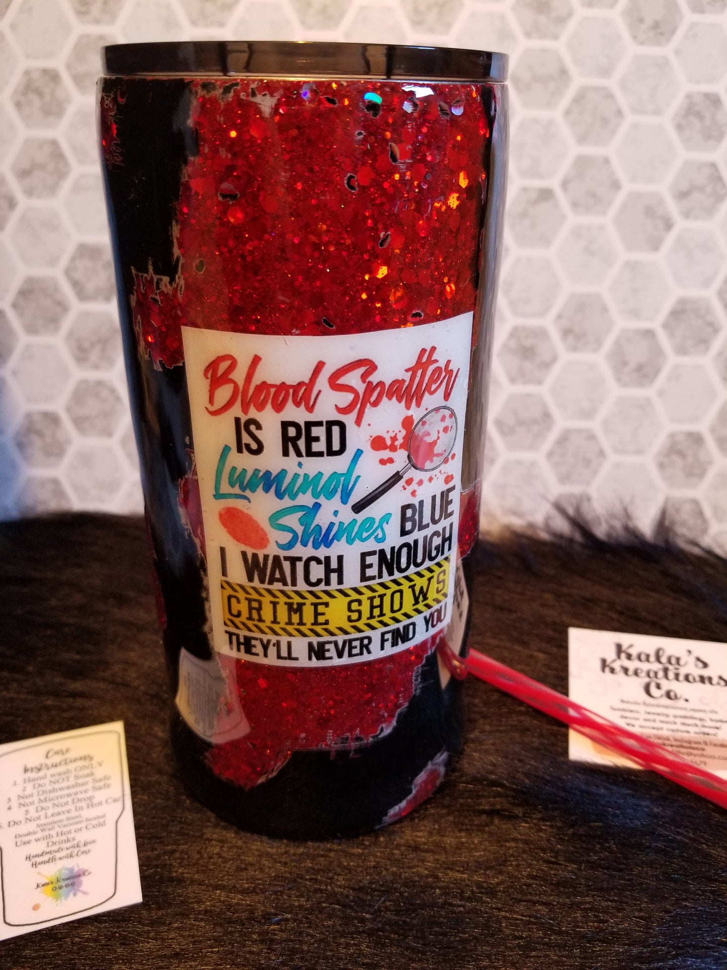 22oz Crime show blood splatter is red quote tumbler